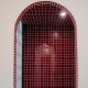 Superbe réalisation client avec le Carrelage uni brillant couleur bordeaux dans une douche. Arches et modernité au rendez vous